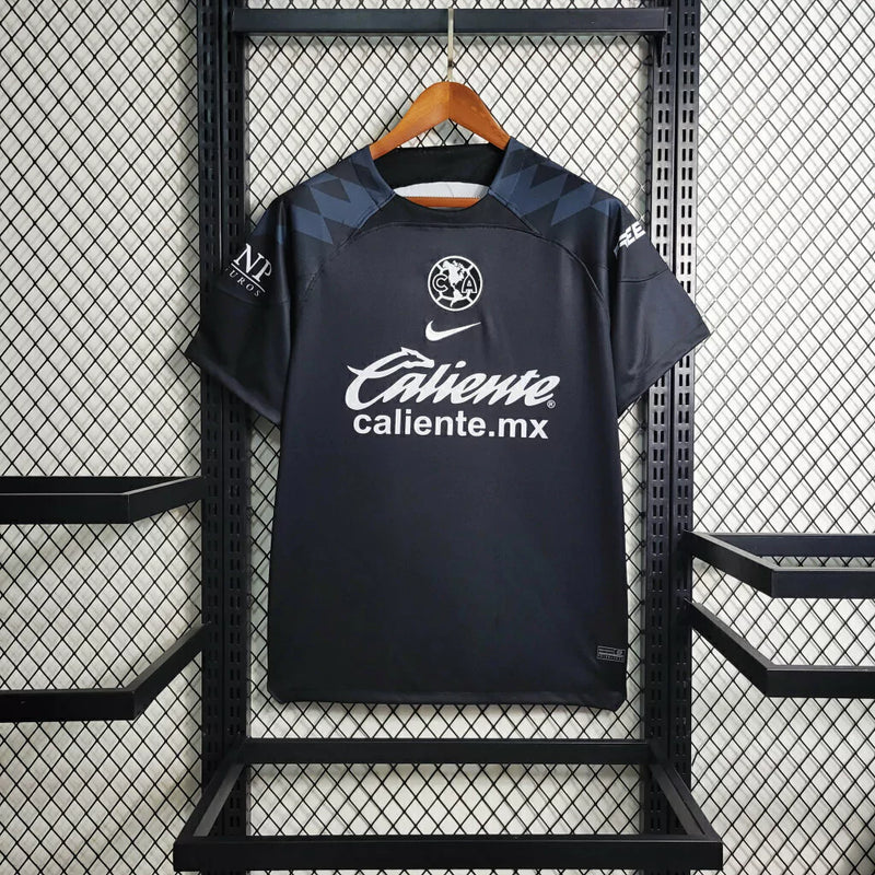 Camisa Club América Treino 2023/24 Torcedor Masculina Preta Nike, uniforme de treino leve e confortável, futebol mexicano, estilo esportivo para torcedores"