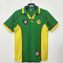Camisa Camarões 1998/99 Puma Retrô Masculina verde, com detalhes em vermelho e amarelo da bandeira, design clássico dos Leões Indomáveis, ideal para colecionadores e torcedoresCamisa Camarões 1998/99
Camisa Camarões retrô verde
Camisa seleção Camarões histórica
Camisa Camarões Puma retrô
Camisa Leões Indomáveis retrô
Camisa Camarões uniforme vintage
Camisa Camarões clássica masculina
Camisa Camarões anos 90
Camisa Camarões coleção retrô
