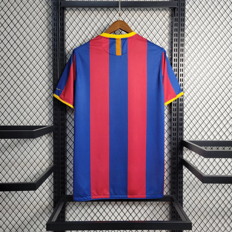 Camisa retrô Barcelona Home 2010/11 Nike Masculina, parte de trás do uniforme azul e grená histórico, ideal para torcedores e colecionadores."