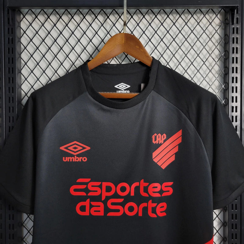 Camisa Athletico Paranaense Away (2) 2023/24 Umbro Torcedor Masculina com escudo oficial bordado e logo Umbro estampado, modelo visitante do clube paranaense.