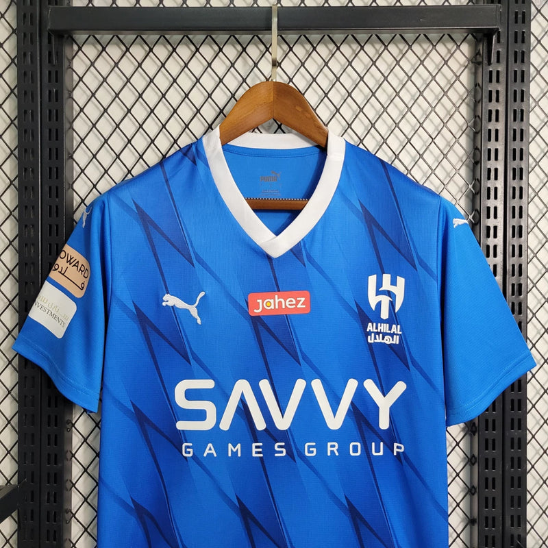 Camisa Al-Hilal (1) Home 2023/24 Puma Torcedor Masculina azul royal com escudo oficial bordado e logo Puma, modelo oficial do clube saudita.