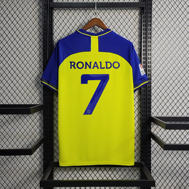 Camisa Al-Nassr Home 2022/23 Torcedor Masculina amarela da Adidas, modelo titular do time saudita, uniforme de futebol confortável em poliéster respirável, ideal para jogos, colecionadores e fãs do clube árabe.