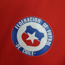 Camisa do Chile 2014 retrô masculina Puma vermelha, modelo Home Copa do Mundo, uniforme clássico da seleção chilena com gola polo azul, escudo bordado e tecido leve."
camisa do Chile 2014
camisa retrô Chile masculina
camisa Puma seleção chilena
camisa Copa do Mundo Chile
