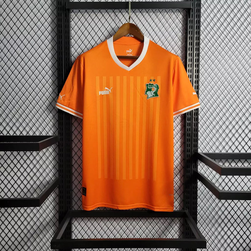 Camisa Costa do Marfim Home I 2022/23 Puma Torcedor Masculina na cor laranja – uniforme oficial dos Elefantes, modelo torcedor, tecido leve e respirável, disponível na Waze Mix."Camisa Costa do Marfim Home 2022
Camisa Costa do Marfim Puma
Camisa Costa do Marfim Laranja
Camisa Elefantes 2022/23
Camisa Costa do Marfim Torcedor Masculina
Uniforme Costa do Marfim Puma
Camisa seleção Costa do Marfim 2022
Camisa oficial Costa do Marfim