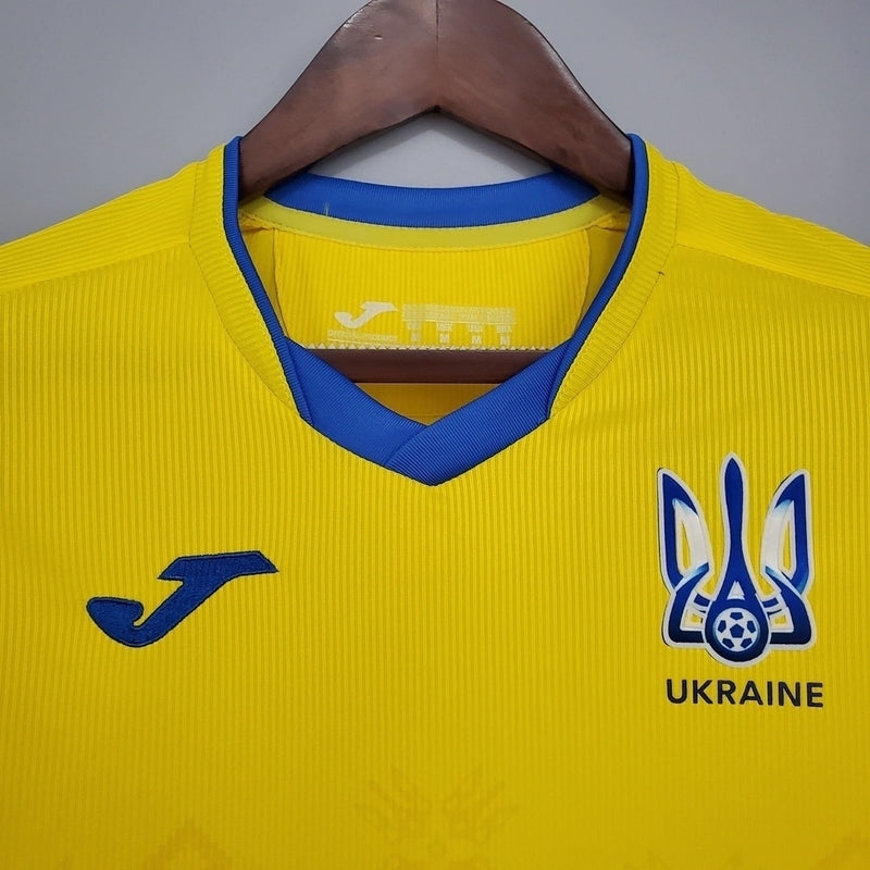 Camisa Ucrânia Home I 2020/21 masculina amarela com detalhes em azul, gola careca e tecido leve respirável para torcedores"