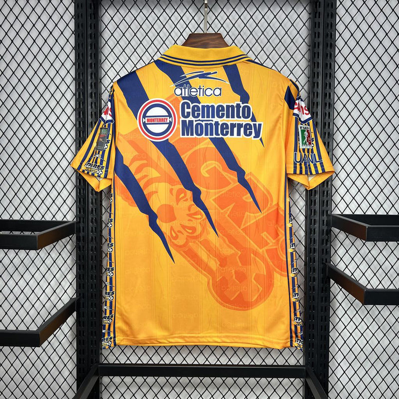 Camisa Tigres Home I 1997/98 Retrô Masculina Amarela, uniforme clássico do clube mexicano, escudo bordado, tecido leve e respirável, estilo retrô e conforto para torcedores"