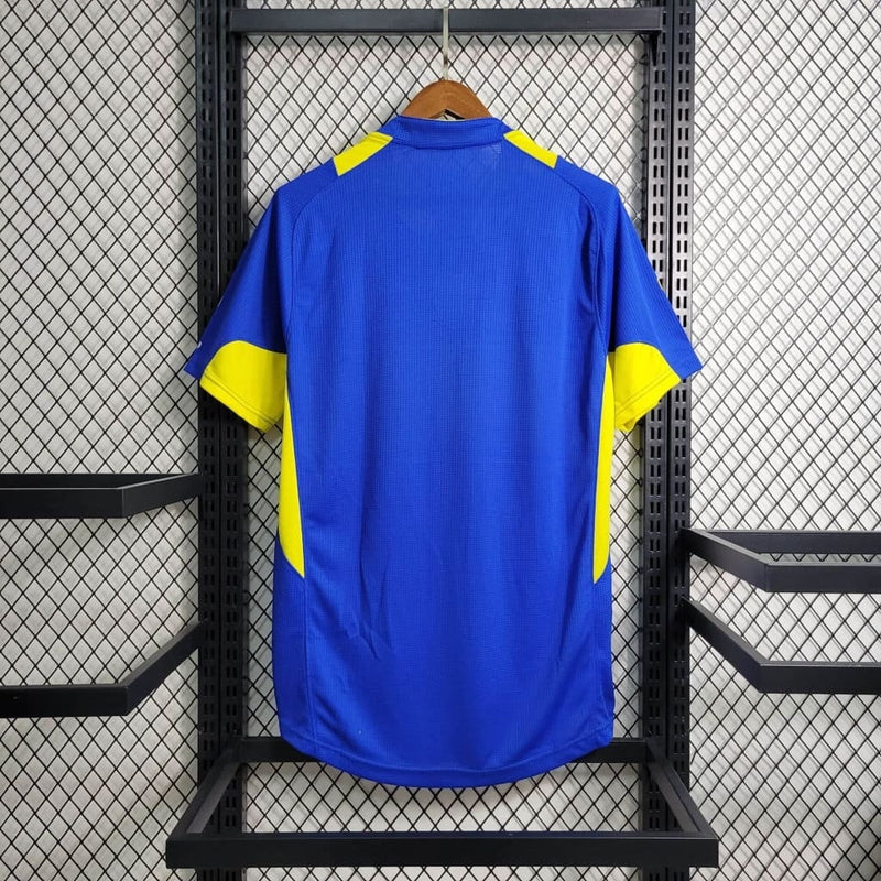 "Camisa Boca Juniors Edição Centenário 2005 Nike Retrô Masculina azul e amarela com escudo bordado e design clássico histórico"