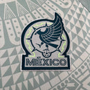 Camisa México Away II 2024/25 Adidas masculina, verde, com escudo da seleção mexicana e detalhes culturais, tecido leve e respirável, ideal para treinos, jogos e torcer pelo time.