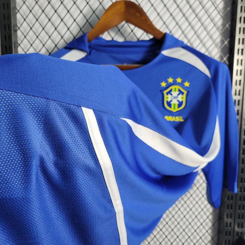 Uniforme retrô Brasil 2002 Nike Away II masculina azul para torcedores e colecionadores