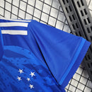 Camisa Cruzeiro Home I 2024/25 Adidas Torcedora Feminina azul com detalhes em branco, escudo bordado do Cruzeiro e gola careca, ideal para torcedoras e fãs do clube