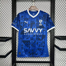 Camisa Al-Hilal Home I 2024/25 Masculina para torcedor, azul com detalhes em branco, modelo oficial do clube saudita, ideal para fãs e colecionadores."