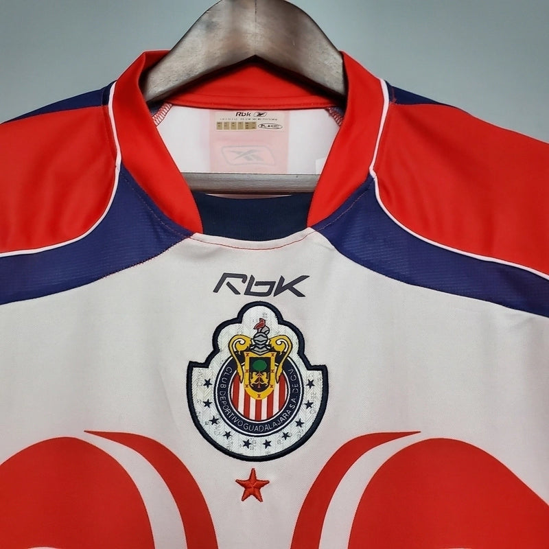 Camisa Chivas Guadalajara Home I 2006/07 Reebok Retrô Masculina Vermelha e Branca, uniforme clássico, escudo bordado, futebol mexicano, retrô colecionável"