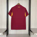 Camisa Roma Home I 2025/26 Adidas Torcedor Masculina grená, com detalhes em amarelo e laranja, escudo bordado da Roma, logo Adidas e tecido Climacool para máximo conforto.