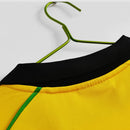 Camisa Jamaica Home I 1998/99 Kappa Retrô Masculina amarela – uniforme clássico da seleção jamaicana, modelo histórico da Copa do Mundo 1998 com detalhes verdes e pretos."