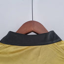 Camisa Venezia Third III 2022/23 Kappa Torcedor Masculina Dourada com detalhes em preto e verde, escudo do clube e design elegante inspirado na moda veneziana.”