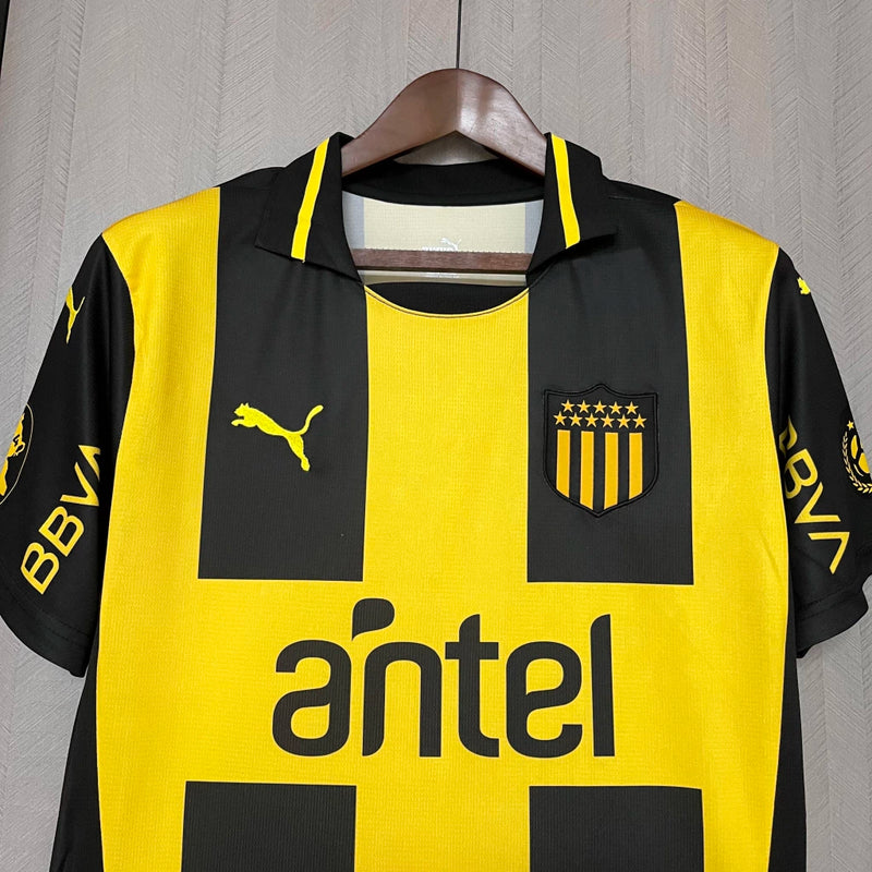 Camisa Peñarol Home I 2025/26 Torcedor Masculina Amarela e Preta, uniforme clássico, futebol uruguaio, escudo bordado, conforto, estilo e tradição para torcedores"