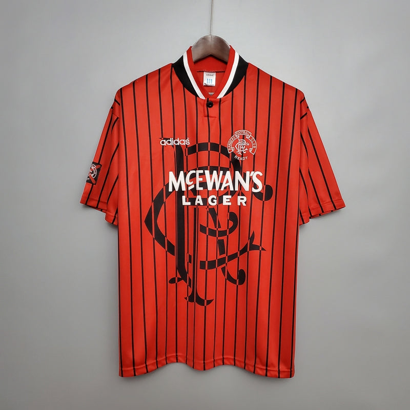 “Camisa Rangers FC Away II 1994/95 Adidas Retrô Masculina Laranja, uniforme retrô clássico do Rangers, design vibrante dos anos 90 e conforto para torcedores apaixonados.”