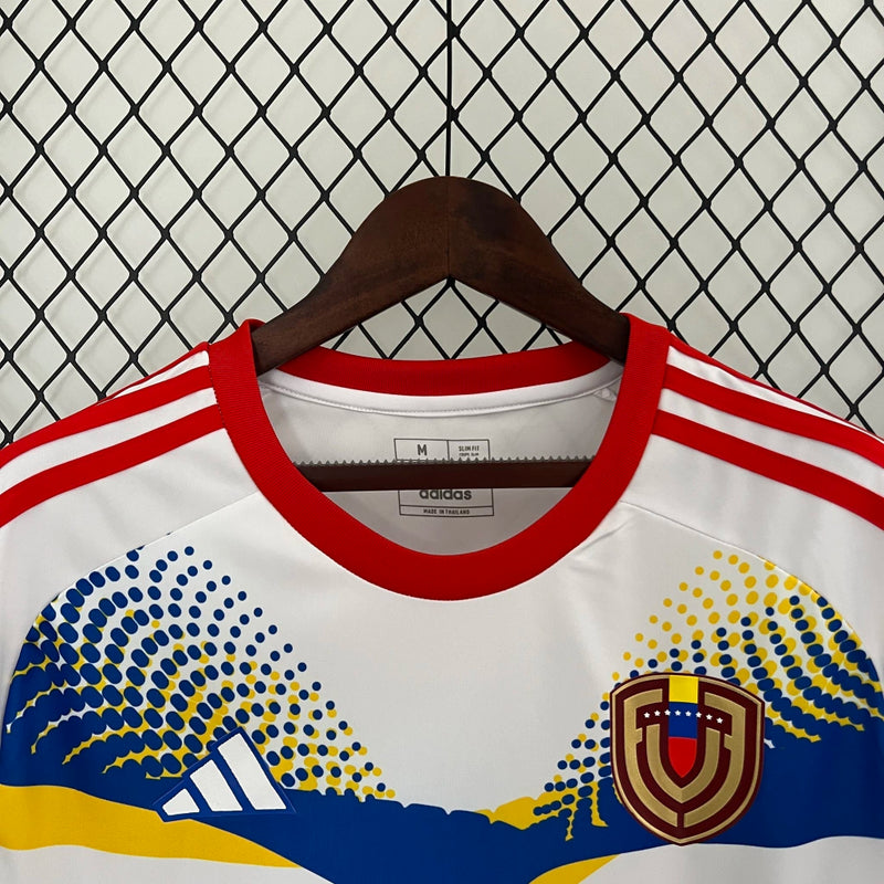 Camisa Venezuela Away II 2024/25 Adidas Torcedor Masculina branca, com detalhes em vinho e azul, tecido leve e respirável, ideal para torcedores da Vinotinto
Camisa Venezuela Away II 2024/25
Camisa Venezuela Adidas branca masculina
Camisa Vinotinto Away 2024/25
Camisa seleção venezuelana masculina
Camisa Venezuela torcedor masculina
Camisa Venezuela futebol 2024/25
Uniforme Venezuela Away Adidas
Camisa Vinotinto masculina branca