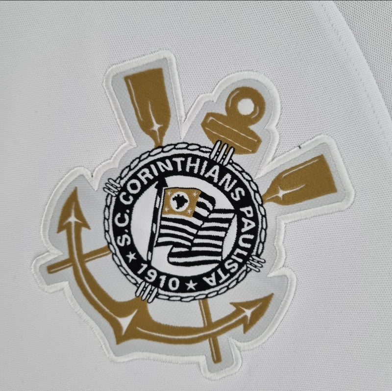 Camisa Corinthians Home I 2022/23 Nike torcedor masculina branca com detalhes pretos, escudo do clube no peito e logotipo da Nike, modelo para torcedores"
