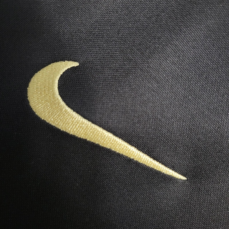 Camisa Corinthians treino 2023/24 Nike manhã longa preta com escudo dourado aplicado