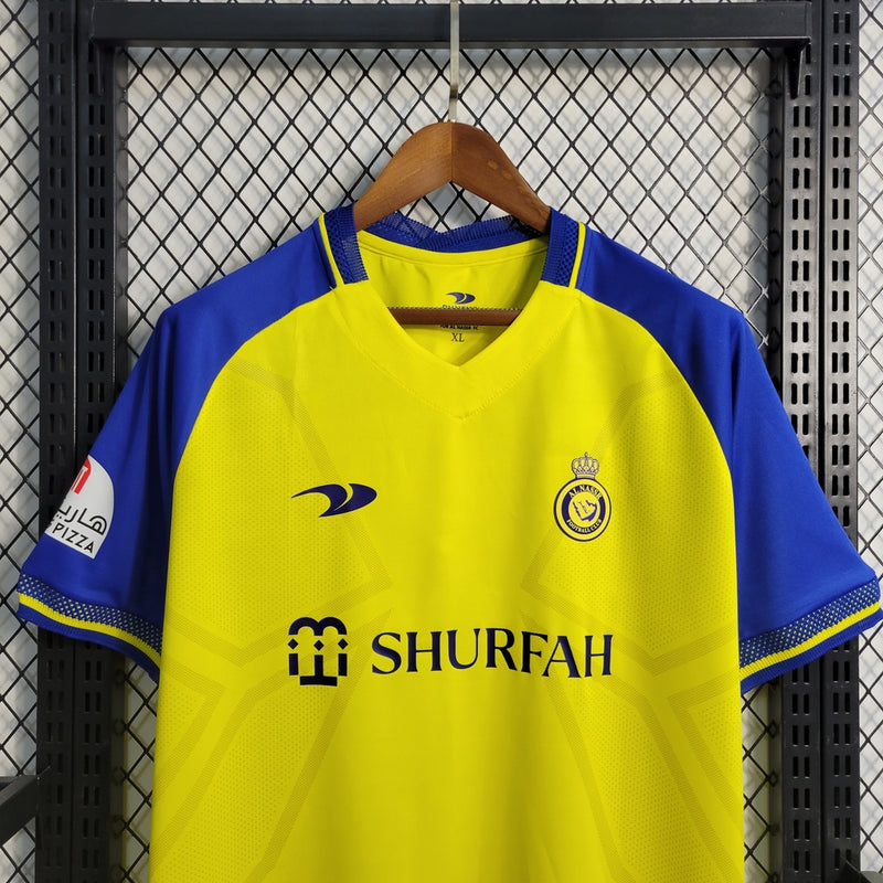Camisa Al-Nassr Home 2022/23 Torcedor Masculina amarela da Adidas, modelo titular do time saudita, uniforme de futebol confortável em poliéster respirável, ideal para jogos, colecionadores e fãs do clube árabe.