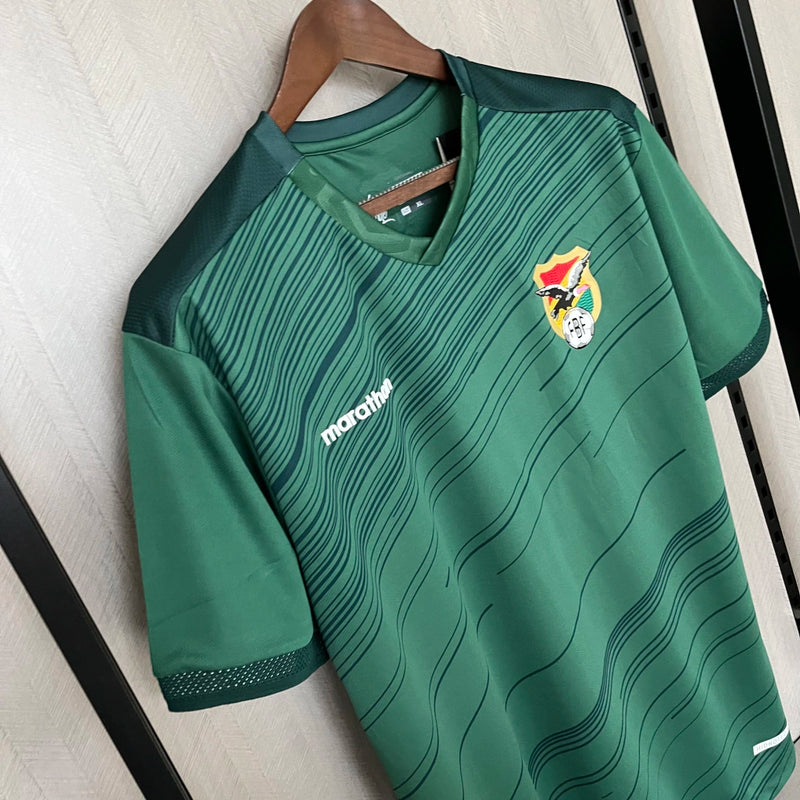 Camisa Bolívia Home I 2023/24 Torcedor Masculina verde, com detalhes inspirados na bandeira boliviana, tecido leve e confortável para torcedores da La Verde
Camisa Bolívia Home I 2023/24
Camisa Bolívia 2023/24 masculina
Camisa seleção Bolívia 2023
Camisa Bolívia verde torcedor
Camisa Bolívia La Verde
Camisa Bolívia masculina 2023/24
Camisa Bolívia nova coleção
Camisa Bolívia futebol 2023/24