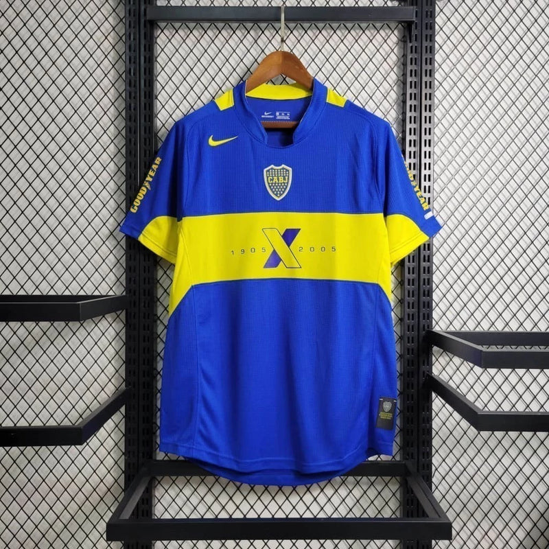 "Camisa Boca Juniors Edição Centenário 2005 Nike Retrô Masculina azul e amarela com escudo bordado e design clássico histórico"