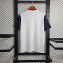 Camisa Japão Concept Samurai 2022/23 Adidas Torcedor Masculina branca, design inspirado nos guerreiros samurais, uniforme conceitual da seleção japonesa de futebol com tecnologia AEROREADY, peça cultural e esportiva para colecionadores.