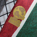 "Camisa Fluminense Home 2024/25 Masculina Umbro para torcedor, tricolor verde, grená e branco, modelo oficial do clube, ideal para fãs do Fluminense Football Club"