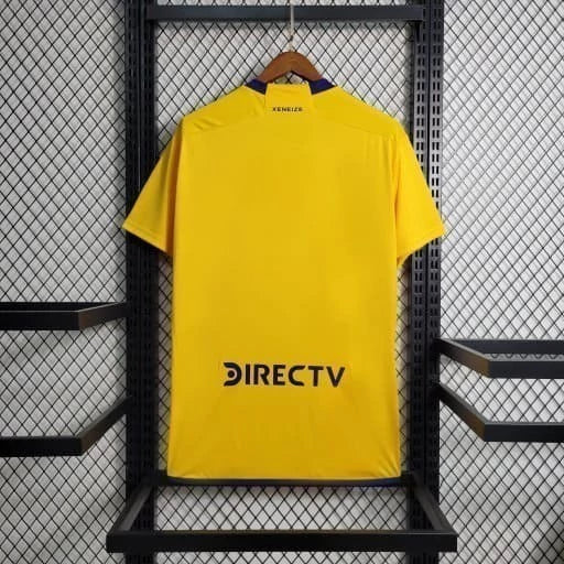 Texto alternativo para imagem:
Camisa Boca Juniors Away (2) 2023/24 Adidas Torcedor Masculina amarela com detalhes em azul, escudo bordado no peito e design oficial da temporada 2023/24.

