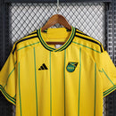 Camisa Jamaica Home I 2023/24 Adidas Torcedor Masculina amarela, uniforme principal da seleção jamaicana, detalhes em verde e preto, tecido leve e respirável, corte masculino."
camisa Jamaica Home 2023/24 amarela
camisa Adidas Jamaica torcedor masculina
uniforme principal seleção Jamaica
camisa Reggae Boyz 2023/24