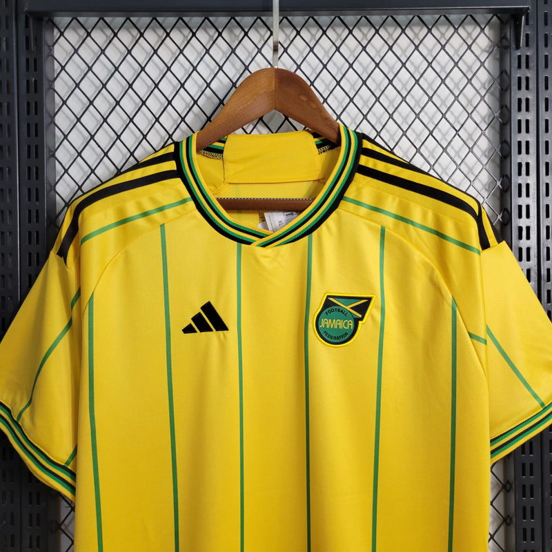 Camisa Jamaica Home I 2023/24 Adidas Torcedor Masculina amarela, uniforme principal da seleção jamaicana, detalhes em verde e preto, tecido leve e respirável, corte masculino."
camisa Jamaica Home 2023/24 amarela
camisa Adidas Jamaica torcedor masculina
uniforme principal seleção Jamaica
camisa Reggae Boyz 2023/24