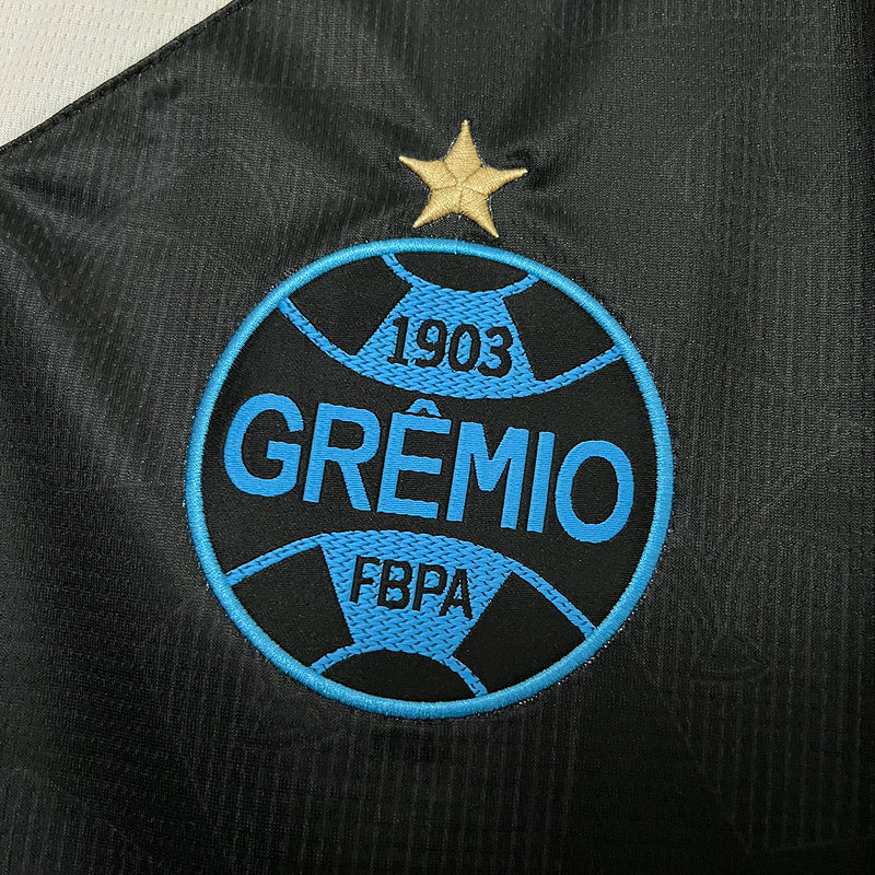 Camisa Grêmio Third III 2024/25 Umbro Torcedor Masculina azul, modelo de torcedor, tecido leve e confortável, design moderno da temporada 2024/25.