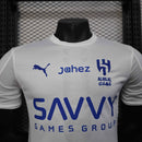 Camisa Al-Hilal Away II 2025/26 Puma Jogador Masculina branca, uniforme do clube saudita Al-Hilal, design moderno com tecnologia Puma DryCell, respirável e confortável, ideal para jogadores, torcedores e colecionadores de futebol asiático.