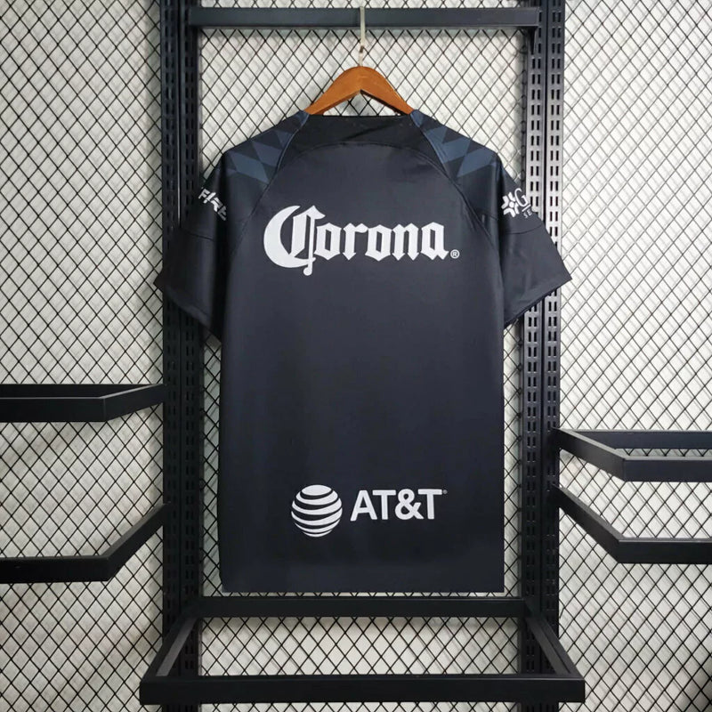 Camisa Club América Treino 2023/24 Torcedor Masculina Preta Nike, uniforme de treino leve e confortável, futebol mexicano, estilo esportivo para torcedores"