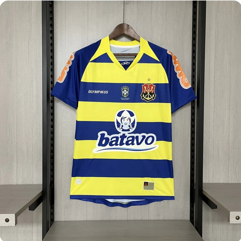 Camisa Flamengo Third III 2010/11 Batavo Retrô Masculina azul e amarela, modelo histórico com escudo bordado e design diferenciado para colecionadores e torcedores.