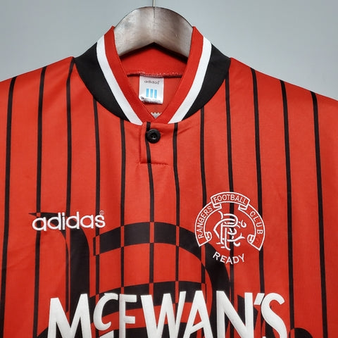“Camisa Rangers FC Away II 1994/95 Adidas Retrô Masculina Laranja, uniforme retrô clássico do Rangers, design vibrante dos anos 90 e conforto para torcedores apaixonados.”