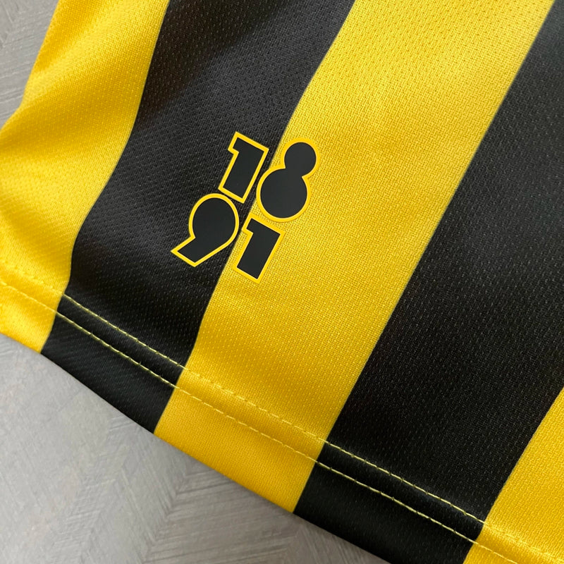 Camisa Peñarol Home I 2024/25 Torcedor Masculina Amarela e Preta, uniforme clássico, futebol uruguaio, escudo bordado, conforto, estilo e tradição para torcedores"