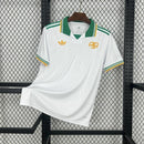 Camisa Napoli Home I 1987/88 Retrô Masculina azul, inspirada na era de Diego Maradona, com design clássico, escudo retrô e gola tradicional, representando o uniforme histórico do Napoli.