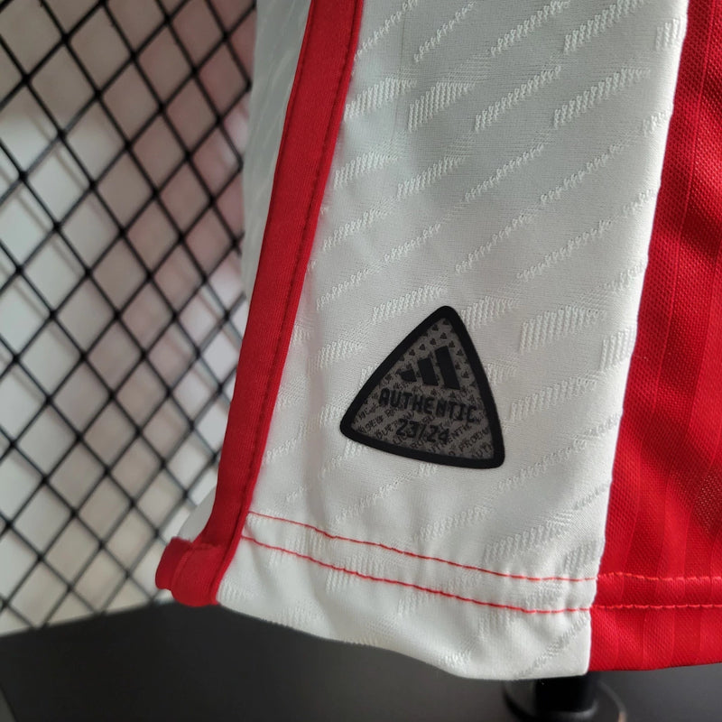 Camisa Ajax Home (1) 2023/24 Adidas Jogador Masculina original, modelo Player Issue branco com faixa vermelha central, tecnologia HEAT.RDY, versão oficial usada pelos atletas."