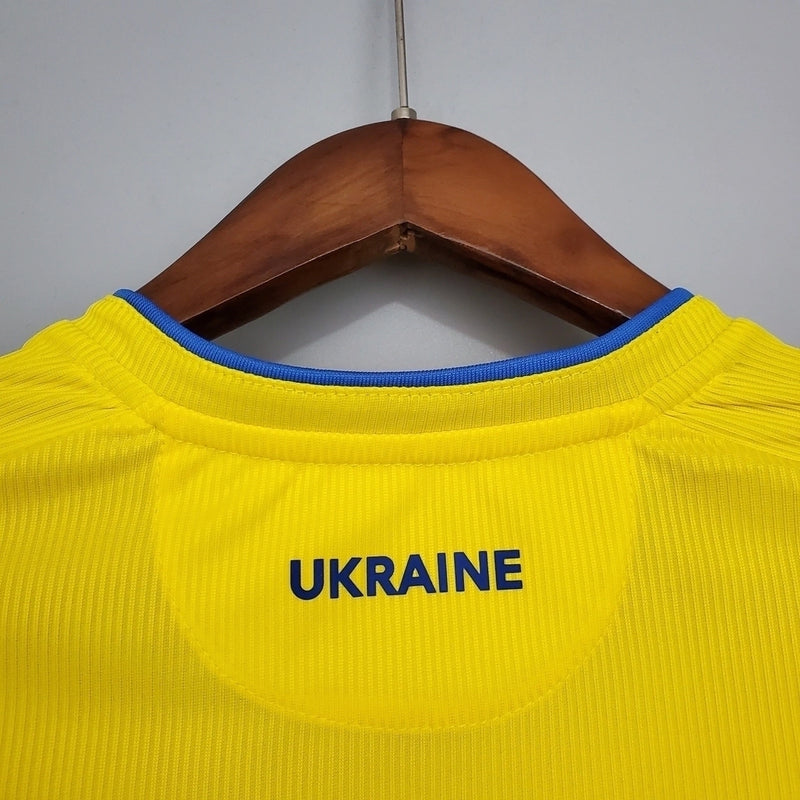 Camisa Ucrânia Home I 2020/21 masculina amarela com detalhes em azul, gola careca e tecido leve respirável para torcedores"