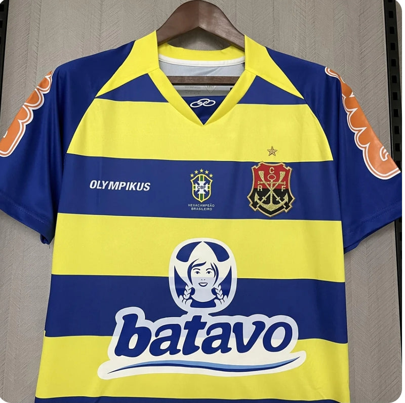 Camisa Flamengo Third III 2010/11 Batavo Retrô Masculina azul e amarela, modelo histórico com escudo bordado e design diferenciado para colecionadores e torcedores.