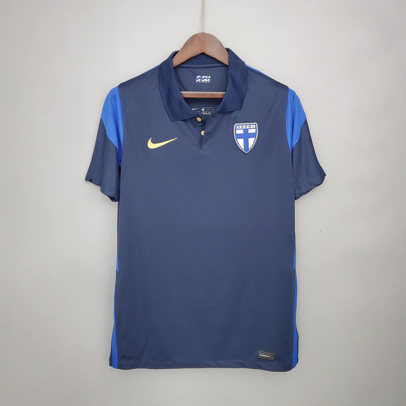 Camisa Finlândia Away II 2020/21 Nike retrô masculina azul marinho com detalhes brancos e dourados, gola redonda e mangas curtas, modelo clássico em tecido leve e respirável para torcedores e colecionadores"