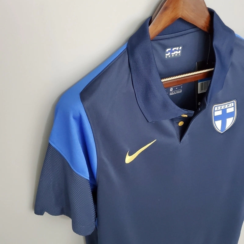 Camisa Finlândia Away II 2020/21 Nike retrô masculina azul marinho com detalhes brancos e dourados, gola redonda e mangas curtas, modelo clássico em tecido leve e respirável para torcedores e colecionadores"