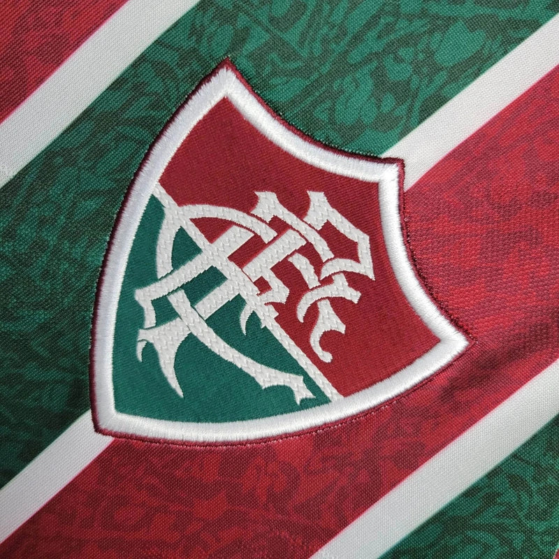 "Camisa Fluminense Home 2024/25 Masculina Umbro para torcedor, tricolor verde, grená e branco, modelo oficial do clube, ideal para fãs do Fluminense Football Club"