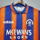 Camisa Rangers FC Away II 1993/94 Adidas Retrô Masculina Laranja, uniforme retrô clássico do Rangers, design vibrante e nostálgico dos anos 90 para torcedores apaixonados.”