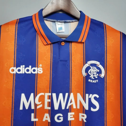 Camisa Rangers FC Away II 1993/94 Adidas Retrô Masculina Laranja, uniforme retrô clássico do Rangers, design vibrante e nostálgico dos anos 90 para torcedores apaixonados.”