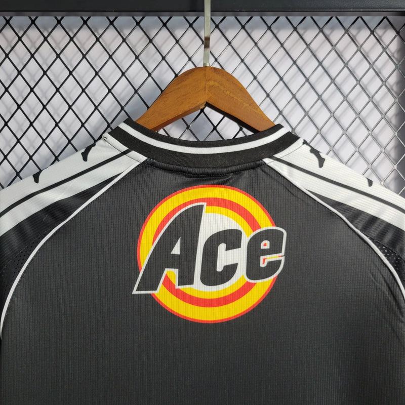 Camisa Vasco da Gama Home I 2000/01 Kappa Retrô Masculina branca com faixa diagonal preta e detalhes em vermelho, gola redonda e escudo bordado do clube.