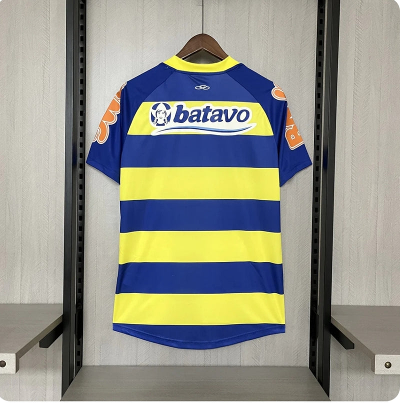 Camisa Flamengo Third III 2010/11 Batavo Retrô Masculina azul e amarela, modelo histórico com escudo bordado e design diferenciado para colecionadores e torcedores.