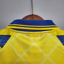 Camisa Parma Home I 1995/96 Puma Retrô Masculina Amarela com escudo bordado, design clássico e acabamento vintage que celebra a era de ouro do futebol italiano.”